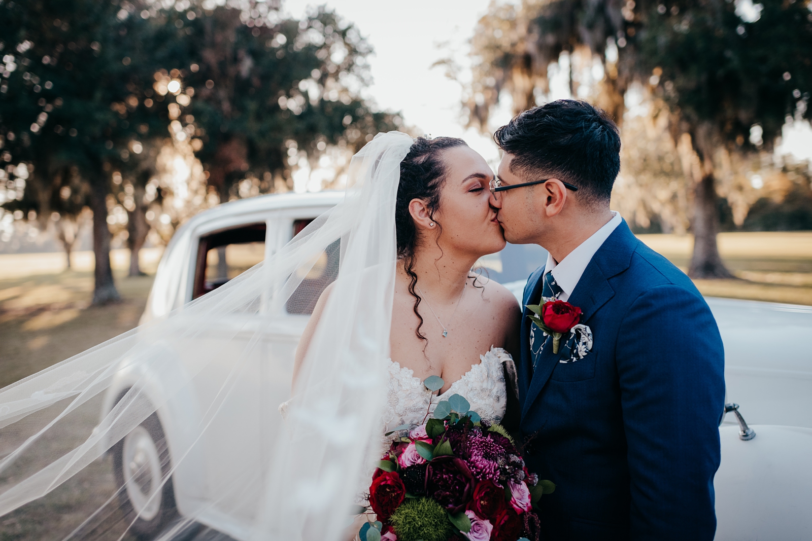 Bride and Groom portraits with vintage car