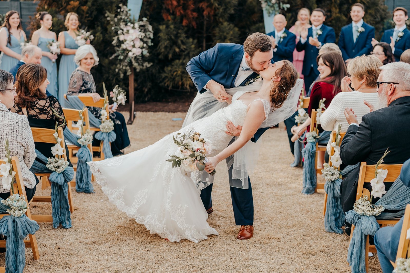 bride and groom dip kiss at Venue 1223 Bluffton