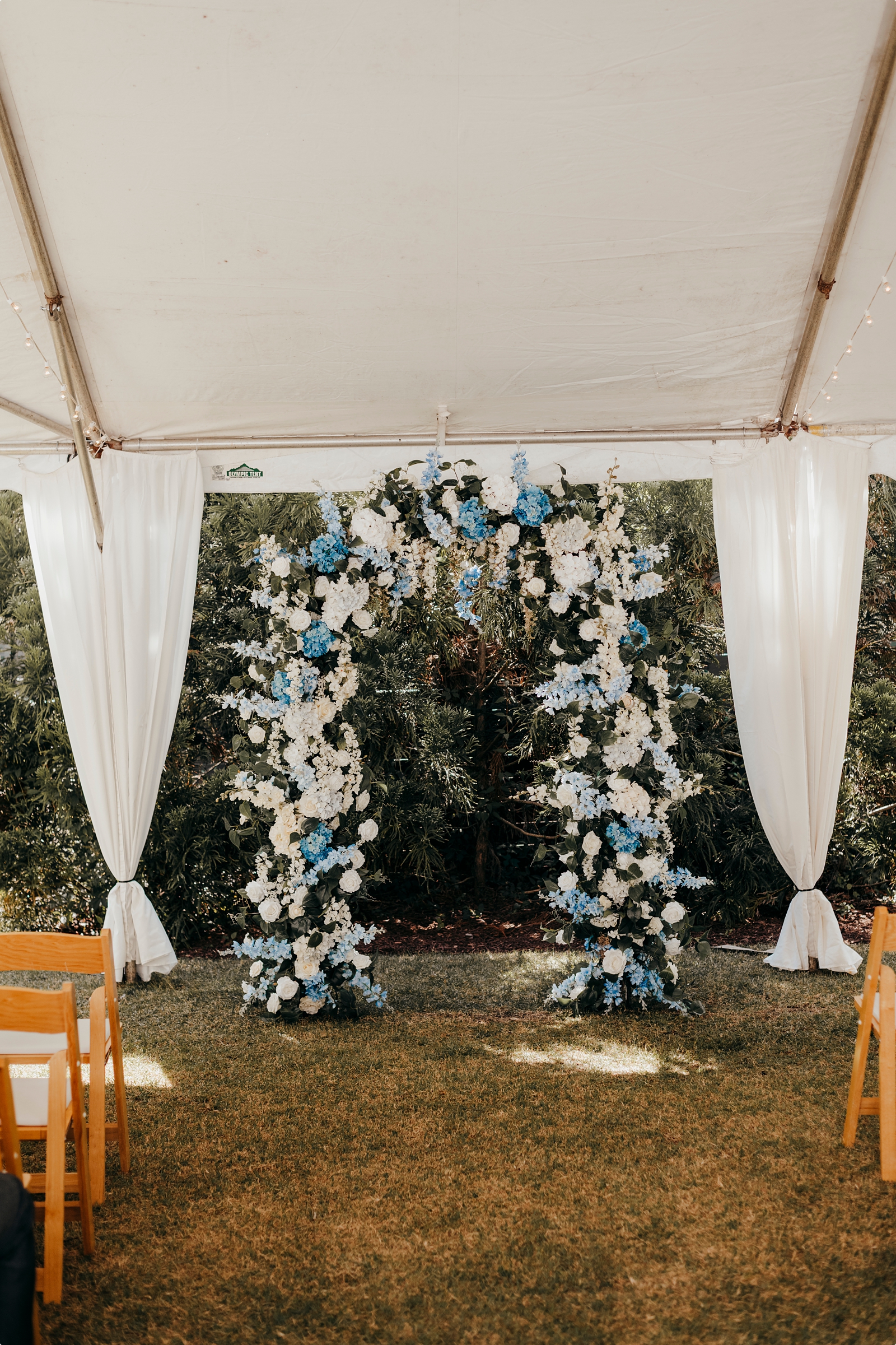 blue and white floral arch at Venue 1223 Bluffton